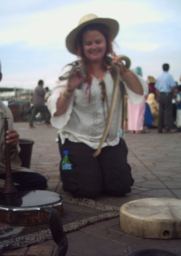 The mother hen covered in snakes in Marrakesh